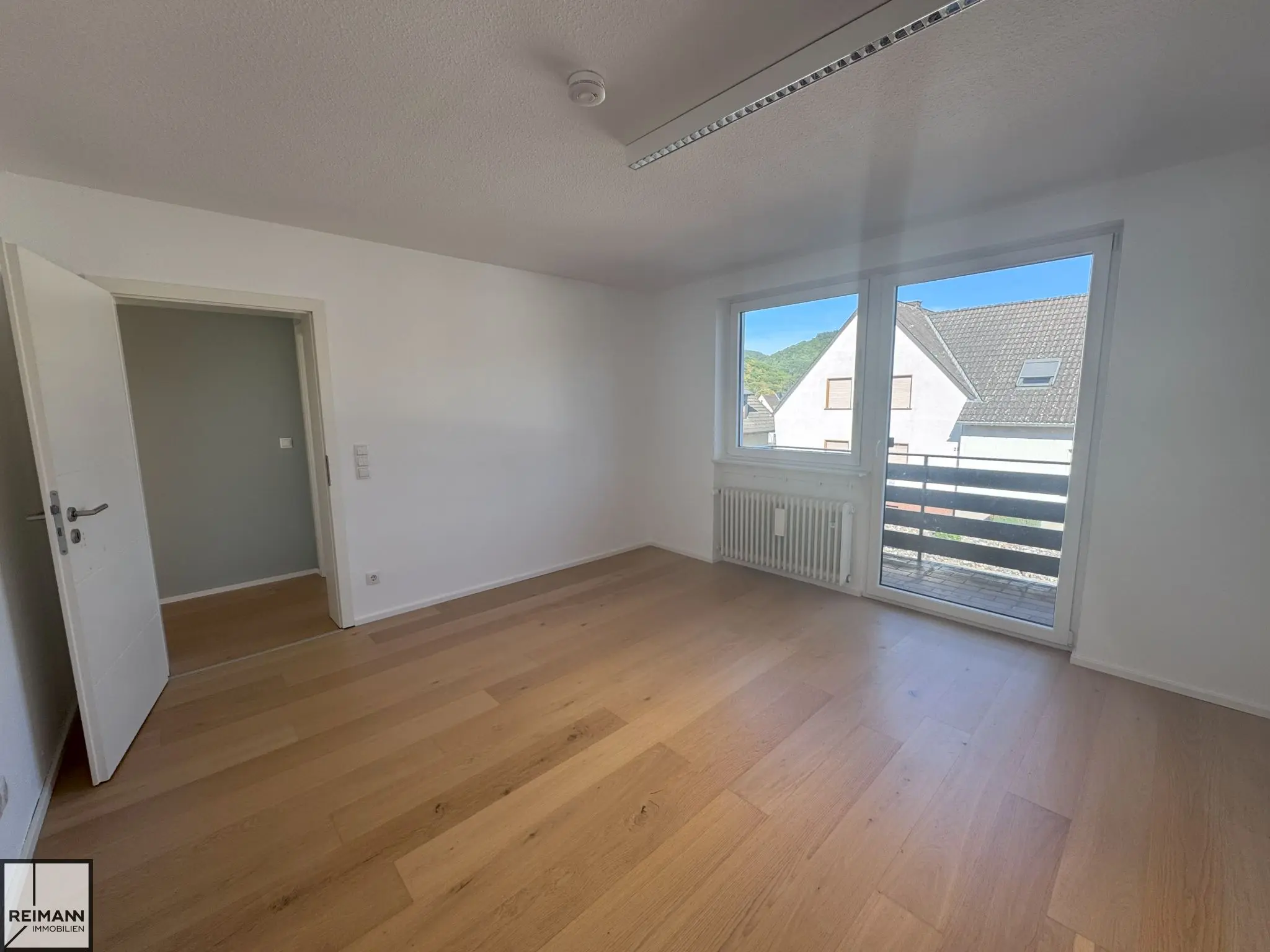 Schlafzimmer mit Balkon